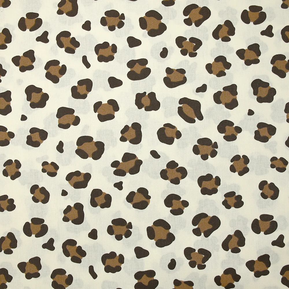 Coton imprimé léopard marron fond blanc cassé