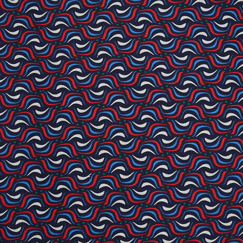 Coton imprimé vague rouge fond marine