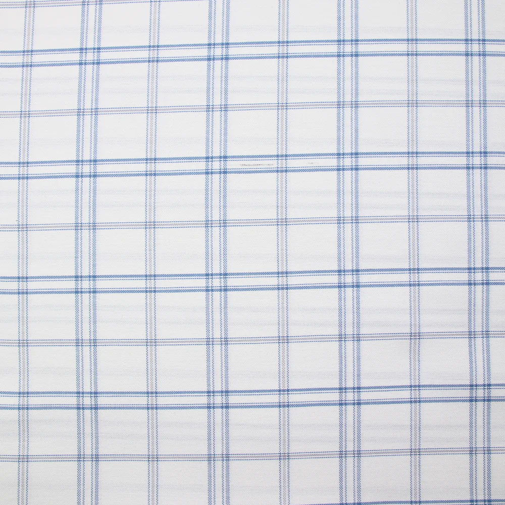 Coton tissé teint carreaux trait bleu fond blanc