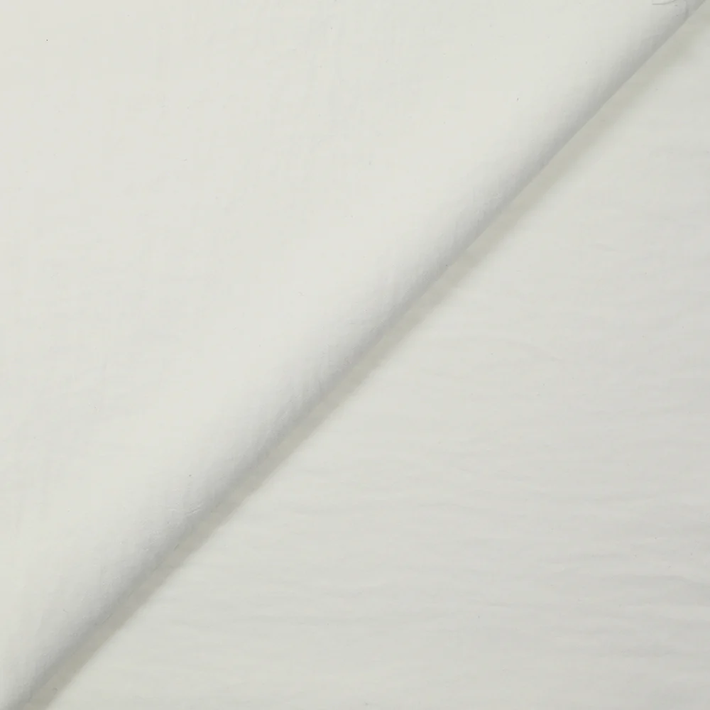 Crêpe polyester blanc cassé