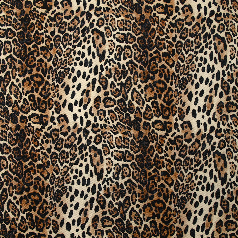 Gabardine de coton élasthanne léopard sauvage fond marron et écru