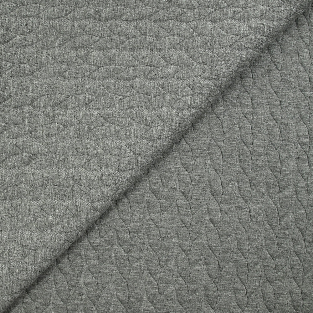 Jersey matelassé tresses fond gris chiné
