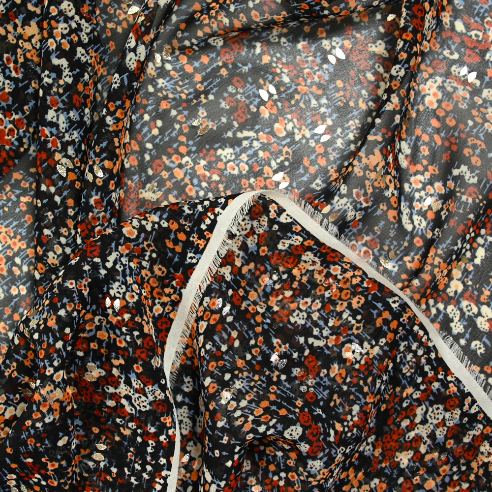 Mousseline imprimée cravate dorée fond noir - Image 3