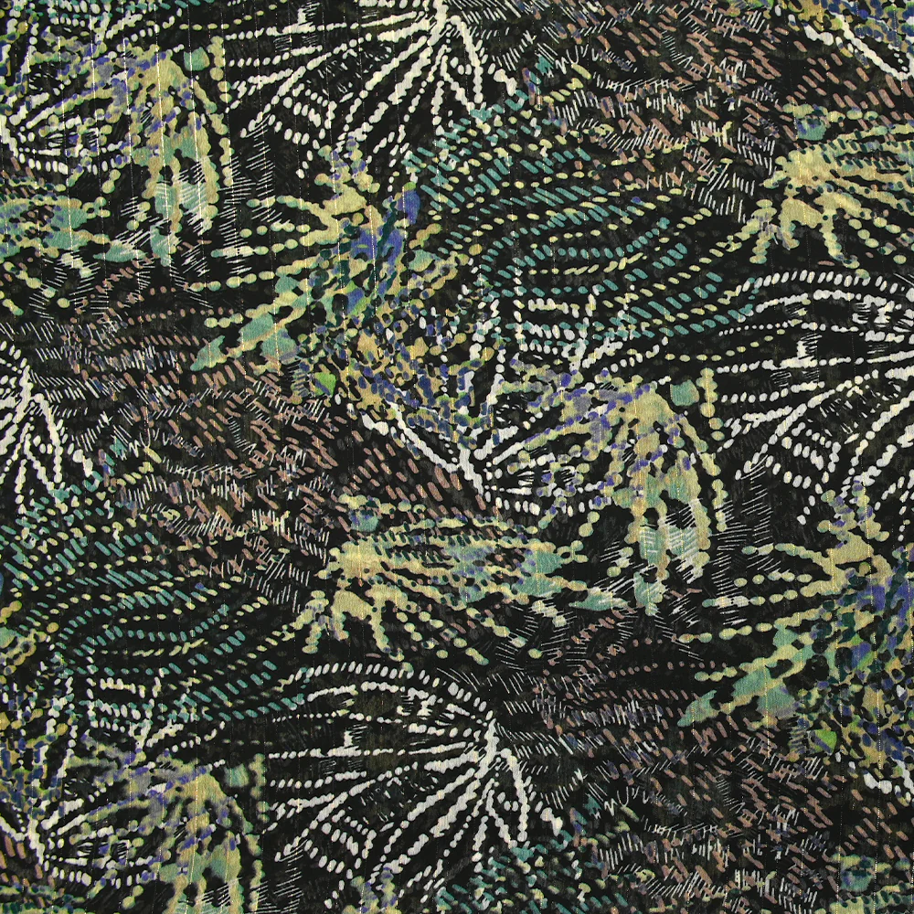 Mousseline imprimée lurex feu d'artifice vert sauge fond noir
