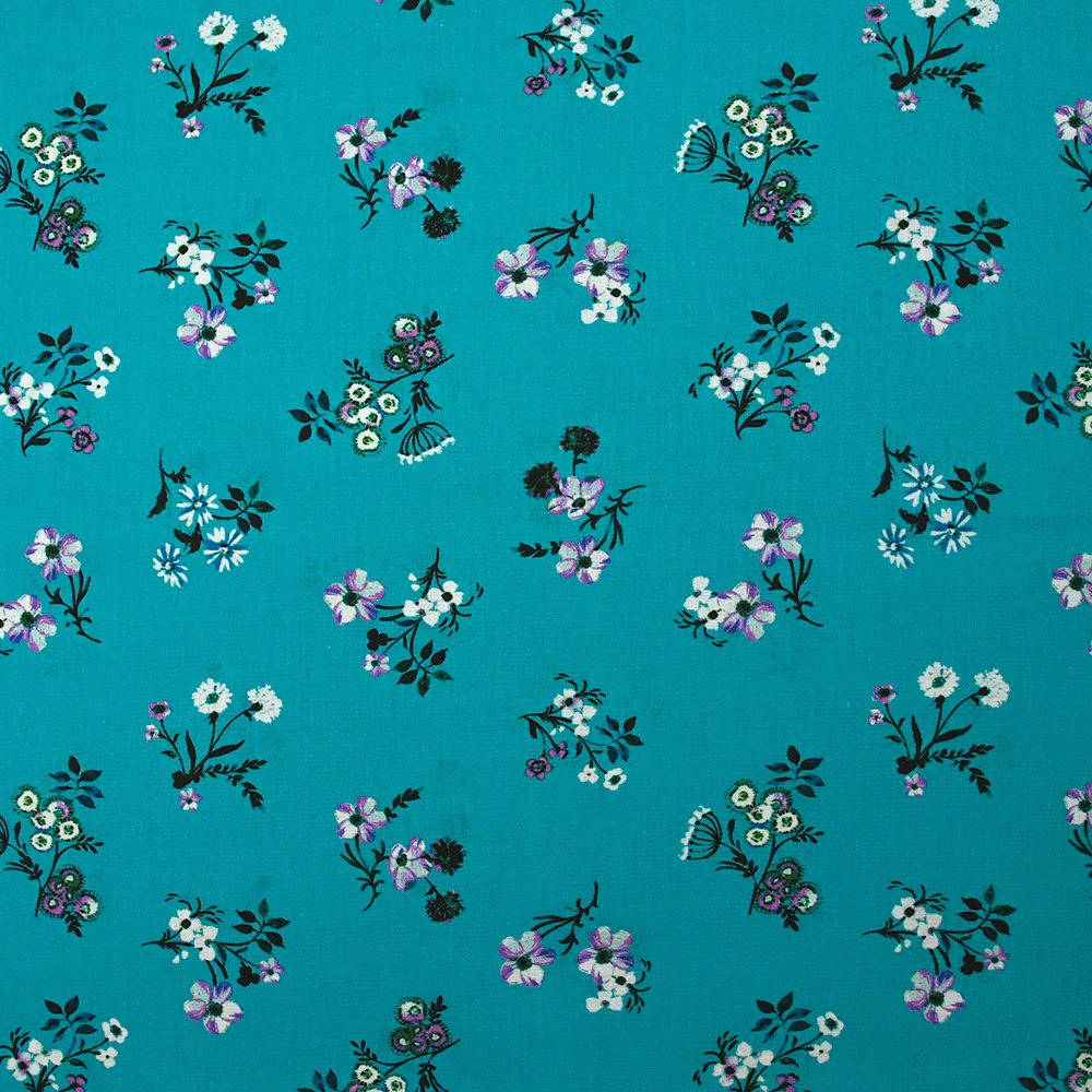 Popeline de coton imprimĂ©e bouquet champĂȘtre fond turquoise
