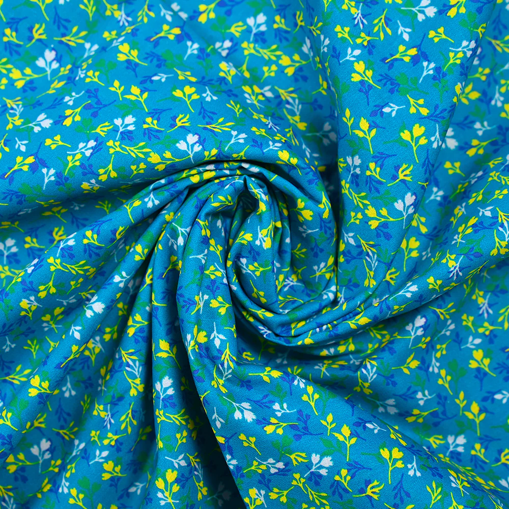 Popeline de coton imprimée bourgeon jaune et bleu fond turquoise - Image 2