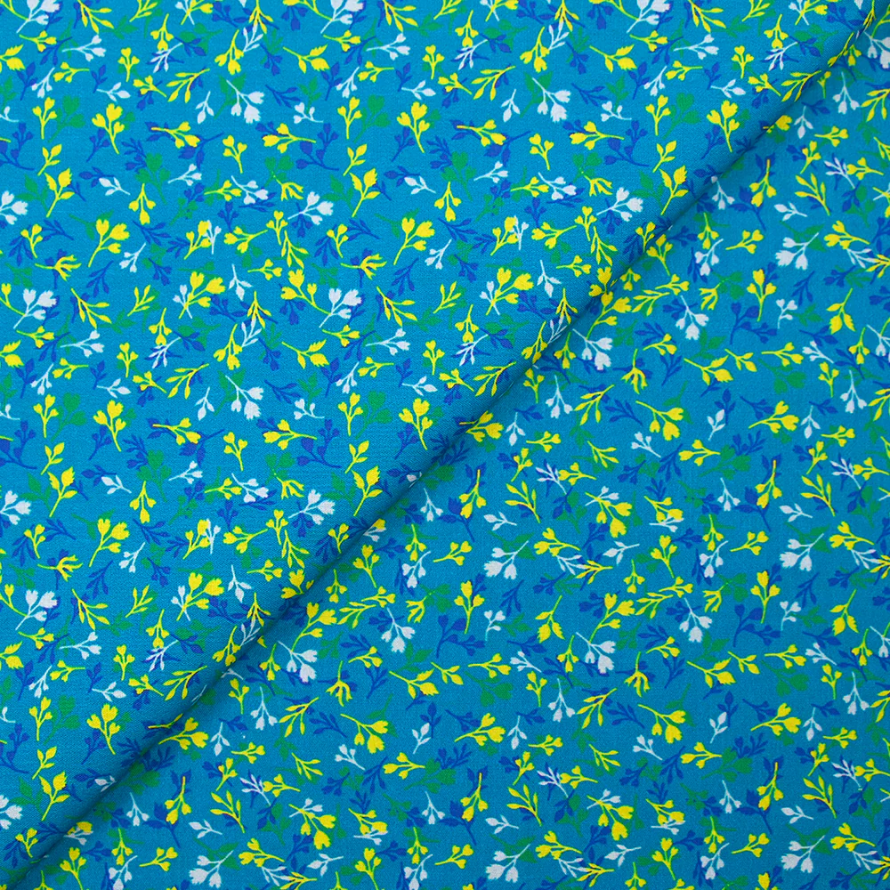 Popeline de coton imprimée bourgeon jaune et bleu fond turquoise - Image 4