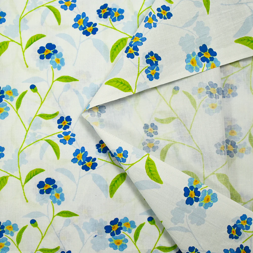 Popeline de coton imprimée fleur bleue et tige verte fond ciel - Image 4