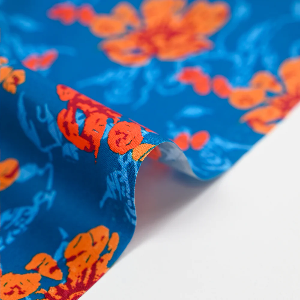 Popeline de coton imprimée fleur stylisée orange fond turquoise - Image 6