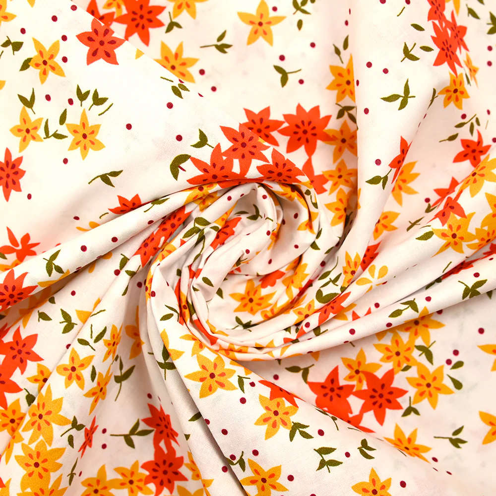 Popeline de coton imprimée fleurs étoilées orange et jaune fond blanc - Image 2