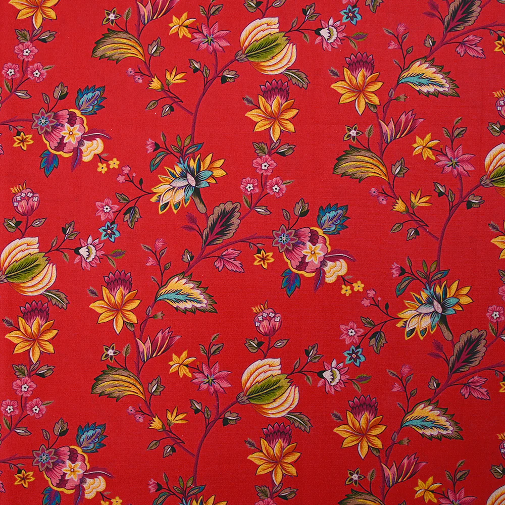 Popeline de coton imprimée jardin du Maharaja fond rouge