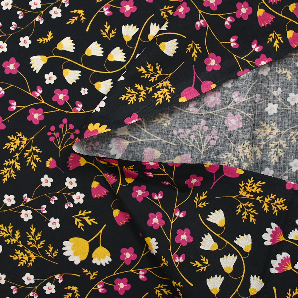 Popeline de coton imprimée tiges de fleurs jaune et fuchsia fond noir - Image 5