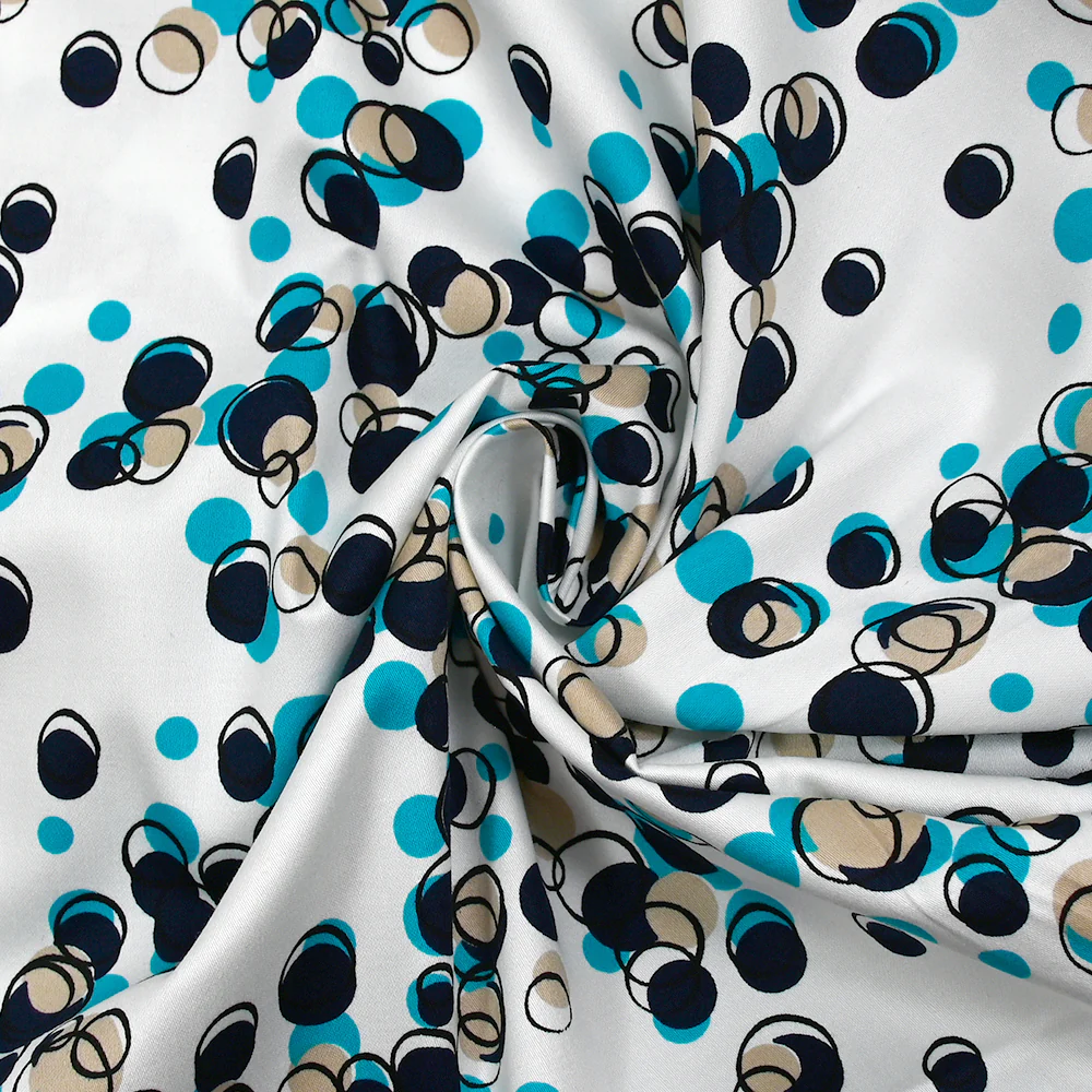 Satin de coton élasthanne dans les bulles turquoise fond blanc - Image 2