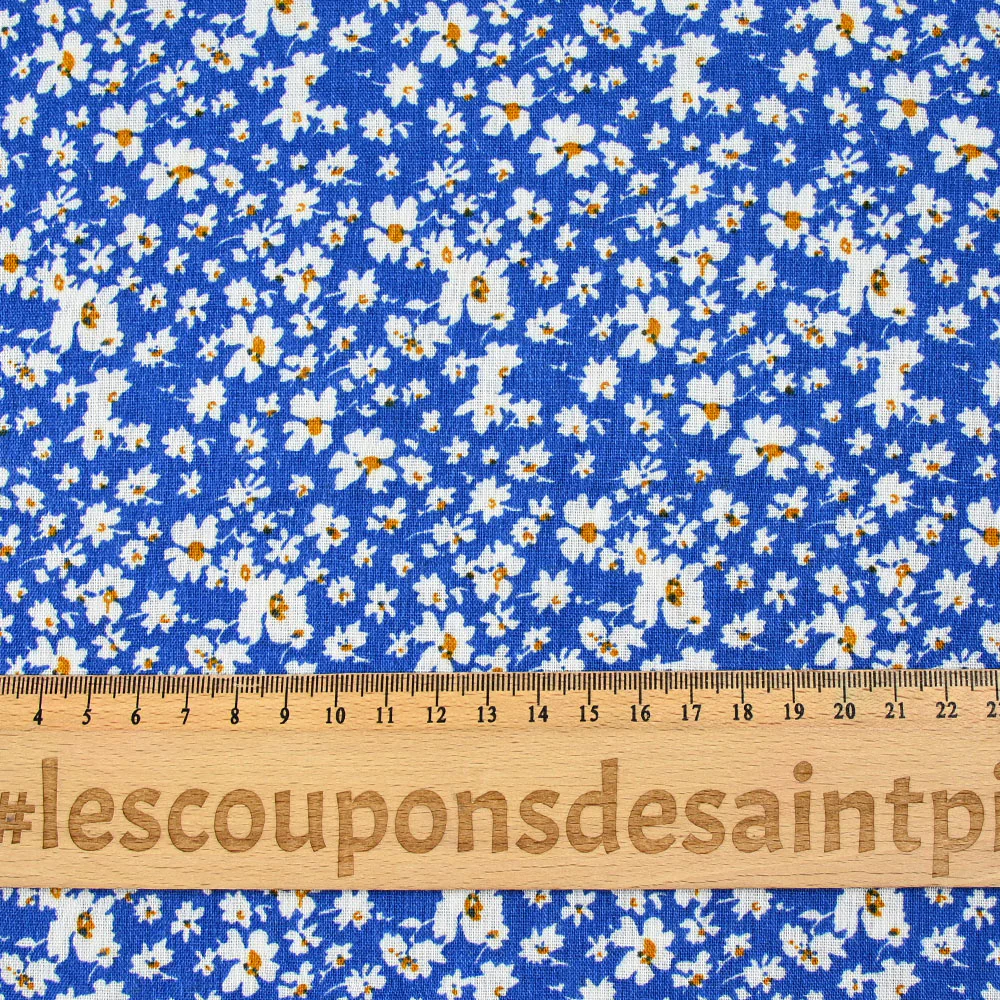 Viscose imprimée fleurs blanches et jaunes fond bleu - Image 3
