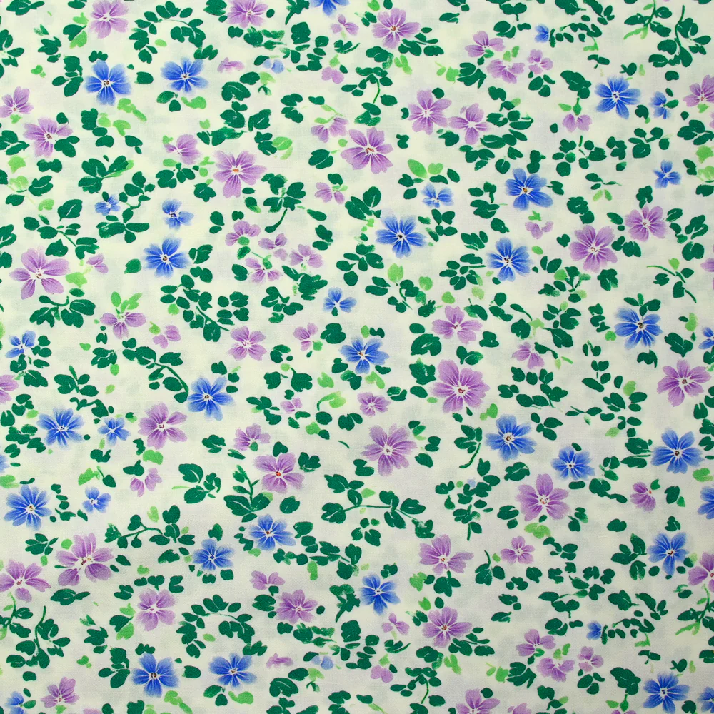 Viscose imprimée fontaine de fleurs bleues et violettes fond écru