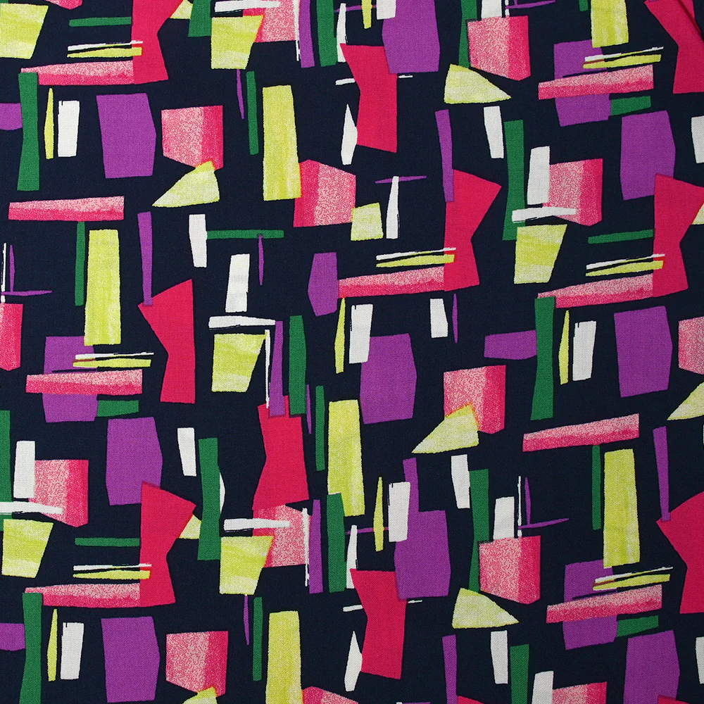 Viscose imprimée graphique fuchsia, mauve et vert fond marine