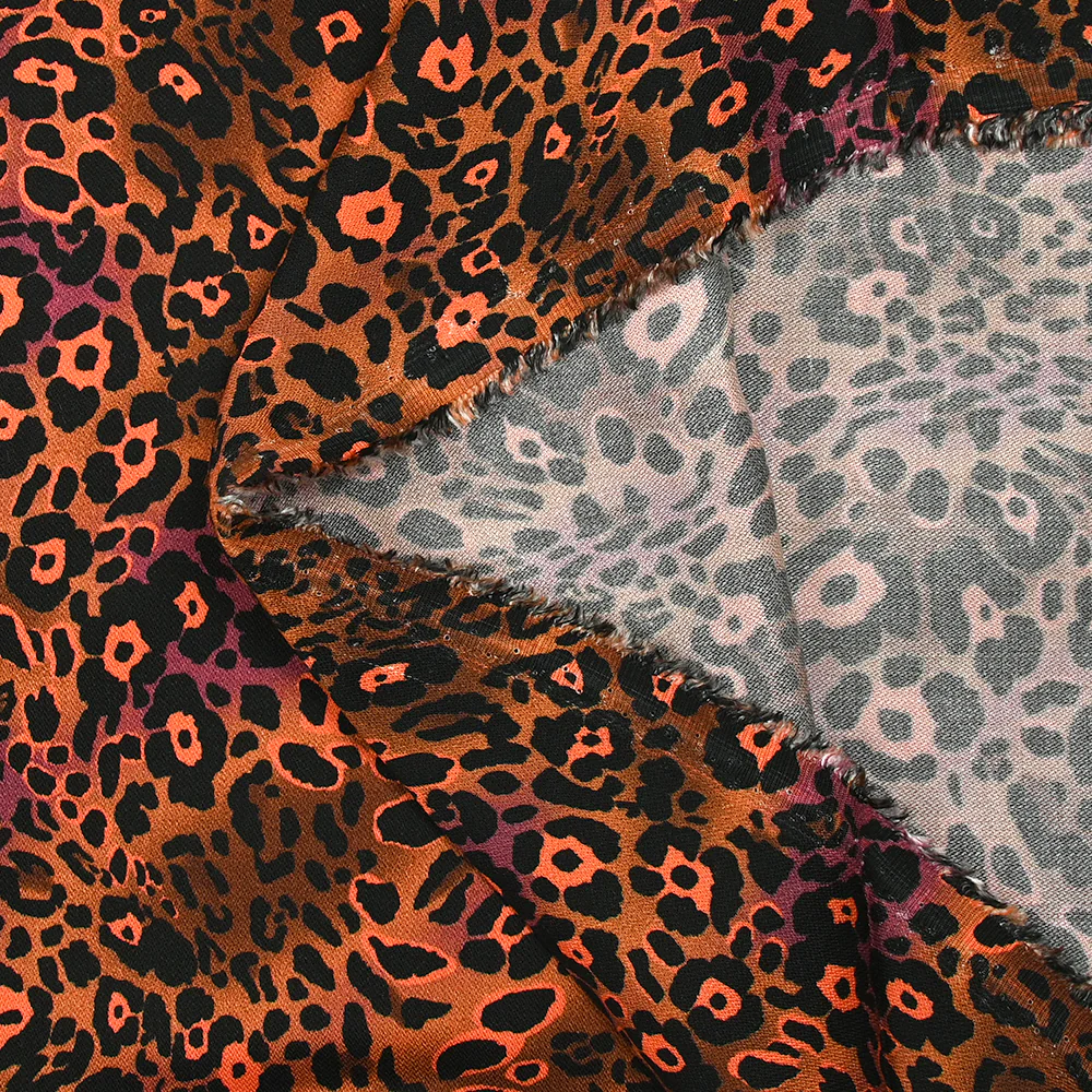 Viscose imprimée léopard orange fluo fond marron - Image 5
