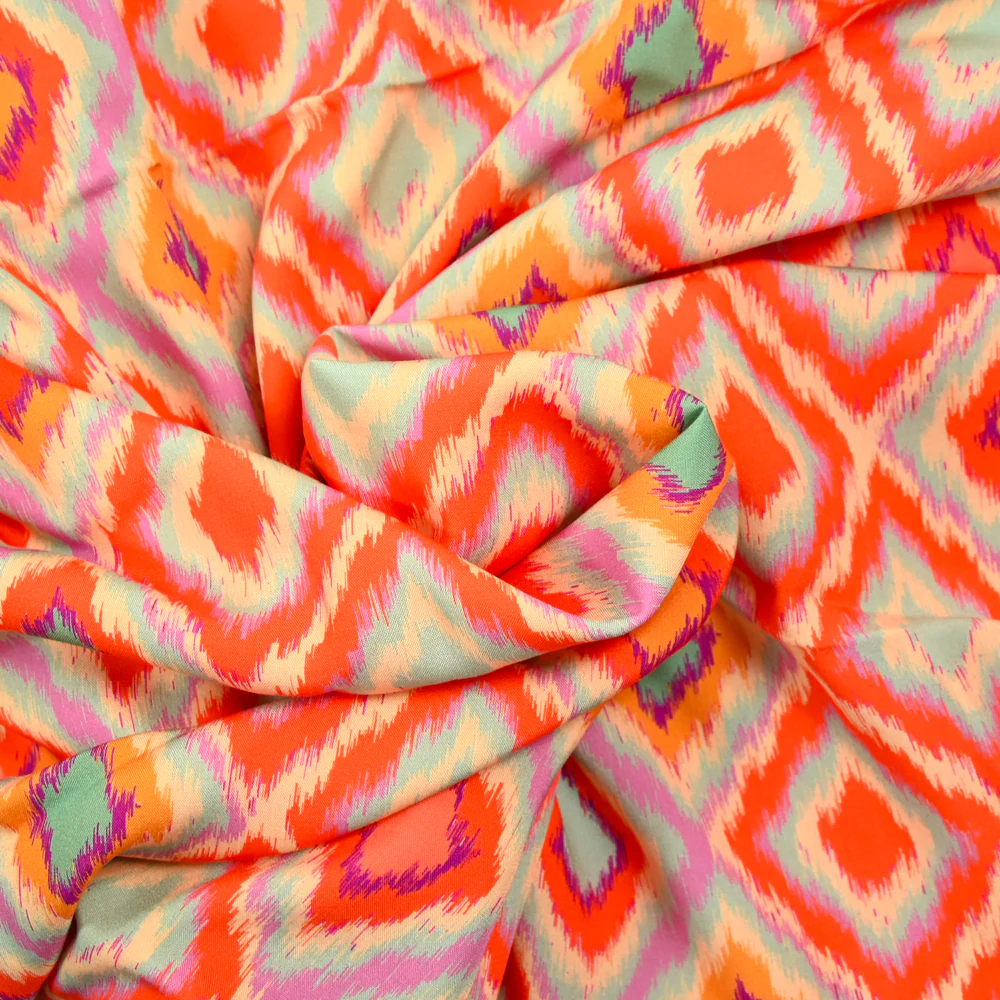 Viscose imprimée losange orange fond parme - Image 2