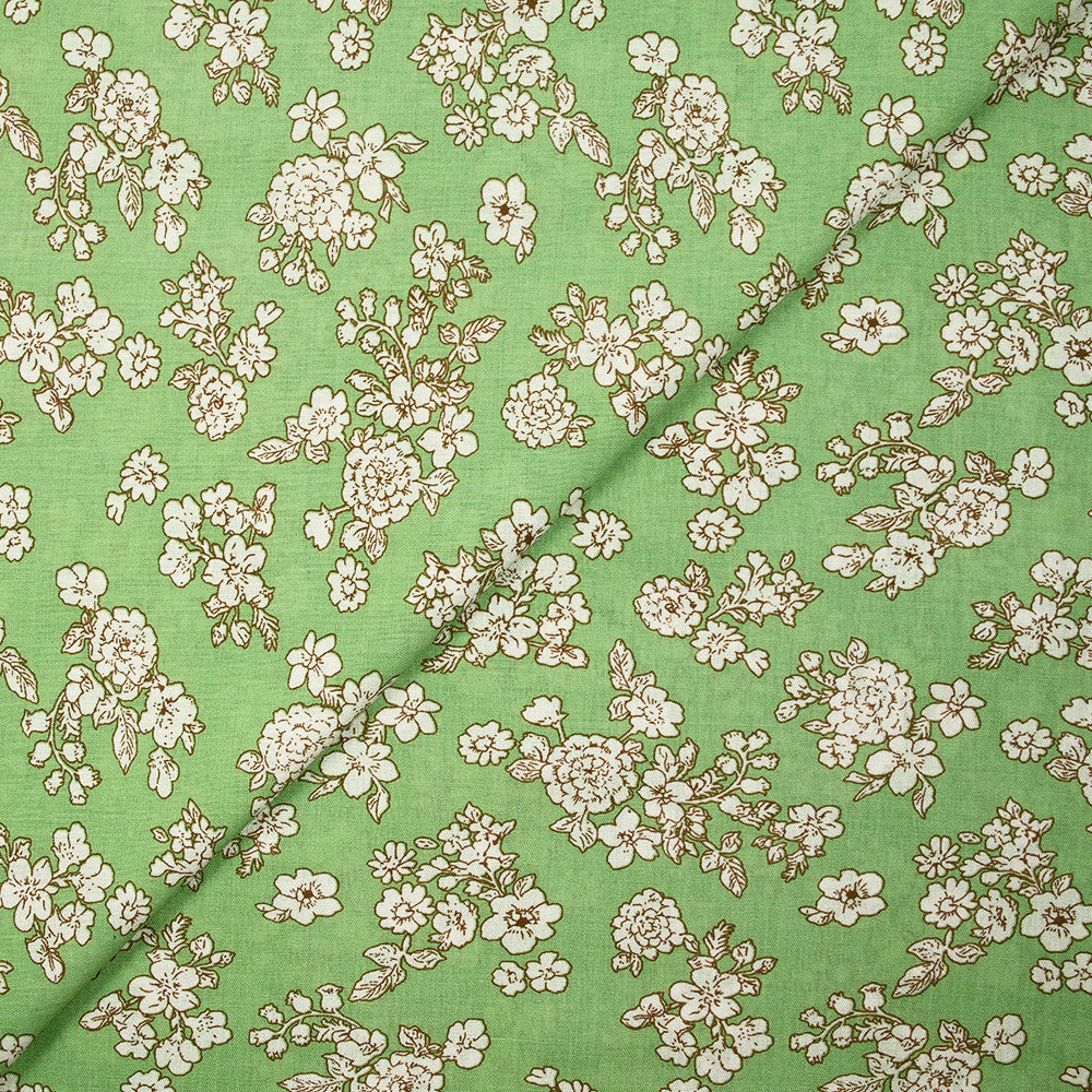 Viscose imprimée printanière blanc cassé fond vert clair